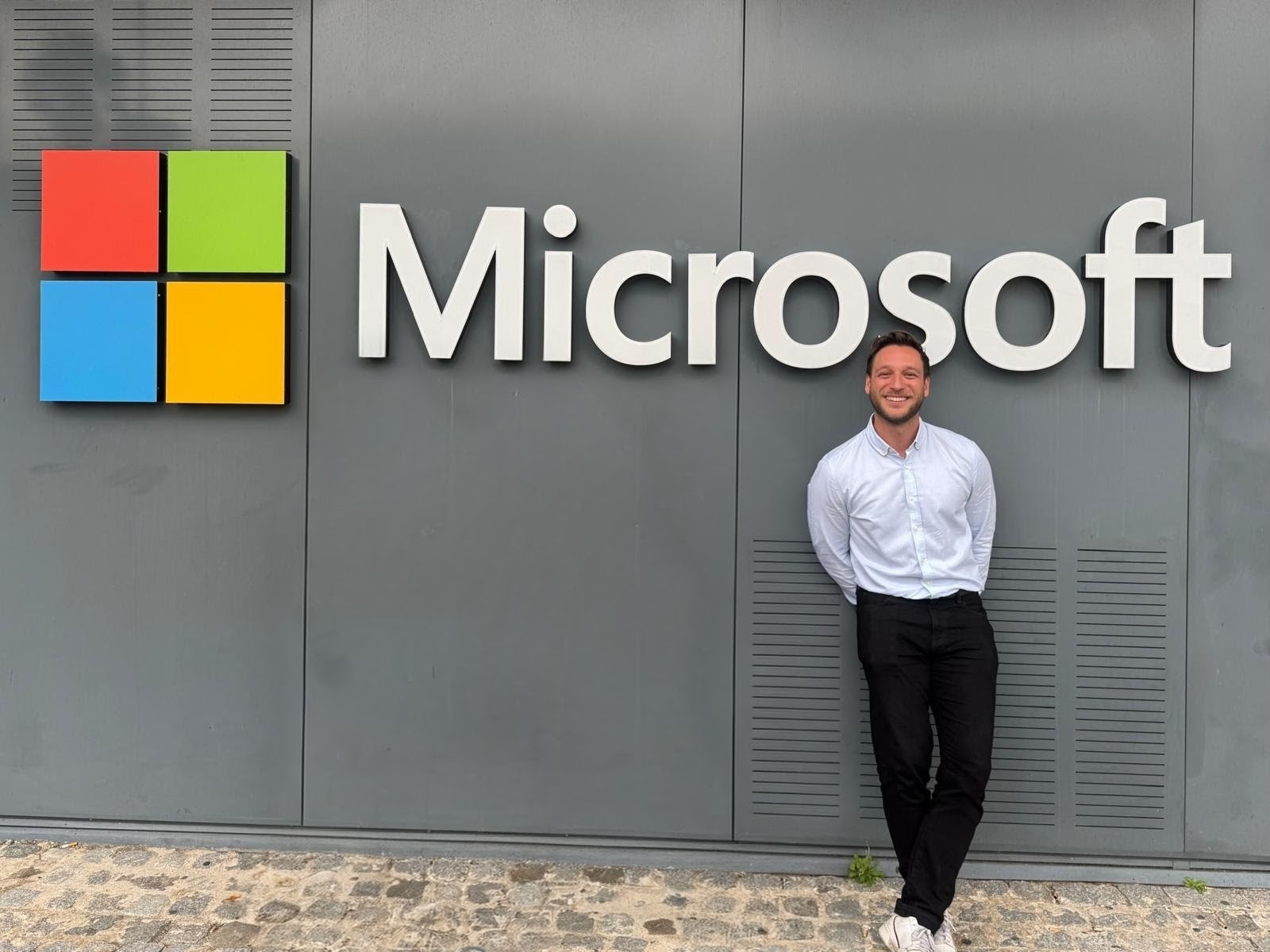 Sam outside the Microsoft office